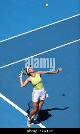 Melbourne, Australia. 17th Jan, 2018. Caroline Wozniacki of Denmark serves during the women's singles second round match against Jana Fett of Croatia at Australian Open 2018 in Melbourne, Australia, Jan. 17, 2018. Caroline Wozniacki won 2-1. Credit: Bai Xuefei/Xinhua/Alamy Live News Stock Photo