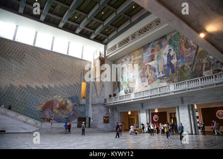 OSLO, NORWAY – AUGUST 18, 2016: Tourists visit in interior of the Oslo City Hall in Oslo, Norway on August 18,2016. Stock Photo