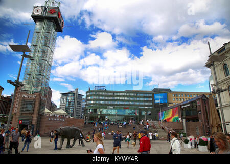 OSLO, NORWAY – AUGUST 18, 2016: People walking on wonderful Plaza in front of Oslo Central station on nice sunny day in Oslo, Norway on August 18,2016 Stock Photo