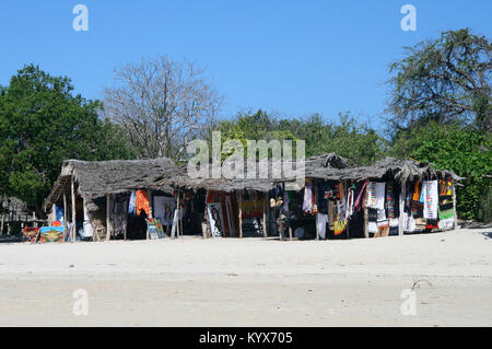 Fabric and tapestry vendor stalls on beach, Zanzibar, Tanzania. Stock Photo