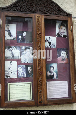 Freddie Mercury house, arabic style art carved board with early pictures, Stone Town, Zanzibar, Tanzania. Stock Photo