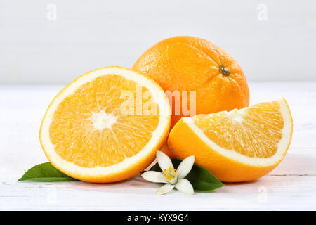 Fresh orange oranges fruit fruits on a wooden board wood Stock Photo