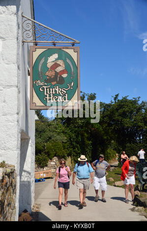 Tourists Outside The Turks Head Pub on the Island of St Agnes, Isles of Scilly, England, Cornwall, United Kingdom. Stock Photo