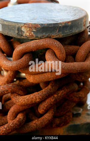 A bollard with large heavy ship chain in Venice, Italy. Stock Photo