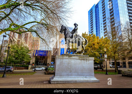 Portland, Oregon, United States - Dec 22, 2017 : Theodore Roosevelt, Rough Rider statue, and Oregon Historical Society Museum, South Park Blocks Stock Photo