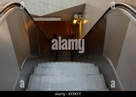 Empty escalator stairs in the metro station. Stock Photo