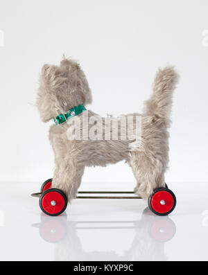 A Vintage German Hermann Brand Mohair Cat Teddy Toy on wheels
