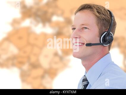Travel agent man wearing headset in front of world map Stock Photo