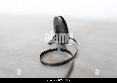 Close-up of film reel on table Stock Photo