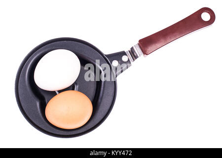 Whole egg in the frying pan. Studio Photo Stock Photo