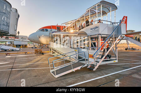 Passengers disembarking an Easyjet aircraft in Gatwick Airport, London. Stock Photo