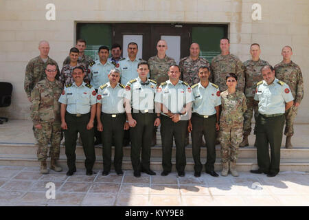 Legal professionals from the Staff Judge Advocate section of the 35th Infantry Division participated in a subject matter expert exchange with lawyers from the Jordan Armed Forces – Arab Army at a base outside of Amman Sep. 11-14, 2017. The exchange focused on topics like law of armed conflict, the Geneva Conventions and Rules of Engagement. Stock Photo