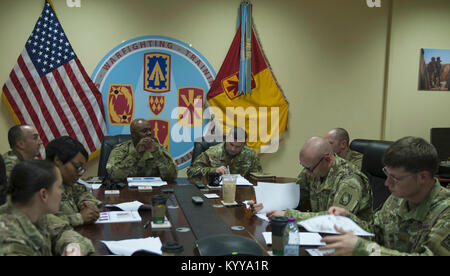 Majors throughout the Top Notch 11th Air Defense Artillery “Imperial” Brigade conduct an open discussion with Col. Issac Gipson (center), commander of Top Notch, during the Majors Forum Al Udeid Air Base, Qatar, Dec. 29, 2017. The Majors Forum was designed to build cohesion, build relationships and provide professional development to the field grade officers. (U.S. Army Stock Photo