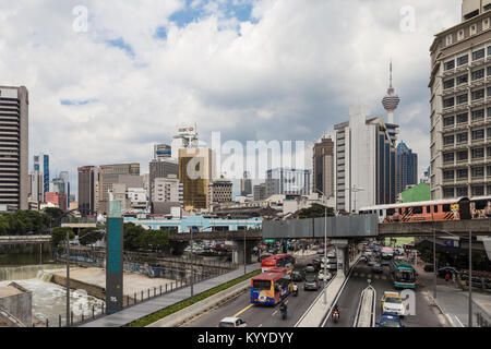 Kuala Lumpur, Malaysia - December 22 2017: Commuter train on its elevated track in the heart of Kuala Lumpur in Malaysia capital city. Stock Photo