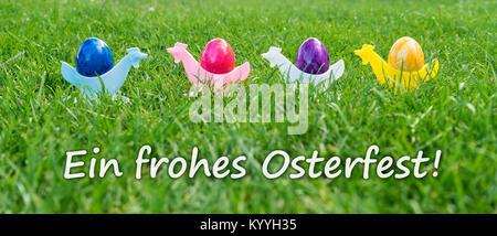 Eastercard with colorful Easter eggs with german text: A Happy Easter Stock Photo