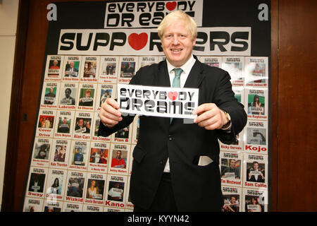 Boris Johnson, Mayor of London, visiting Gladesmore secondary school, to support their campaign to get their song 'Everybody Dreams' , showing the pos Stock Photo