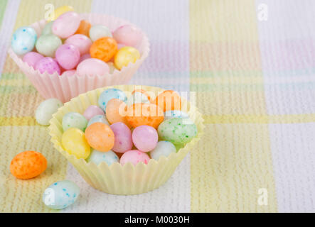 Speckled Easter egg candy in paper cups Stock Photo