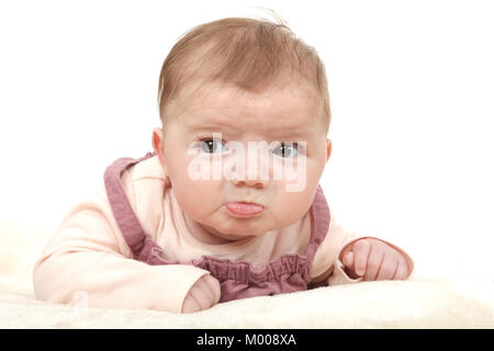 11 week old baby girl in very bad mood, upset, pet lip, postnatal depression Stock Photo