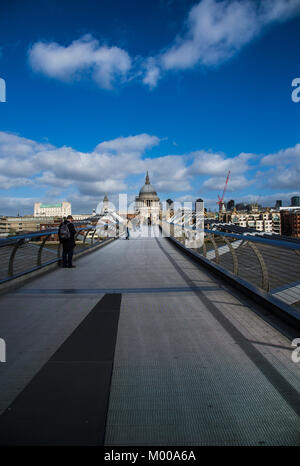 The Millennium Bridge or the London Millennium Footbridge over the river Thames linking Bankside with the City of London and showing the south side of St Paul's Cathedral Stock Photo