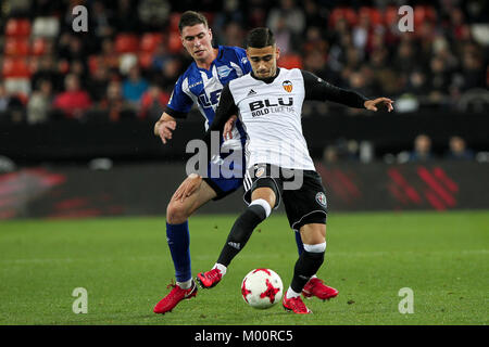 Dieguez of Deportivo Alaves  (L) in action against Andreas Hugo Hoelgebaum Pereira   during spanish King cup match between Valencia CF vs Deportivo Alaves     at Mestalla  Stadium on  January  17, 2018. Stock Photo
