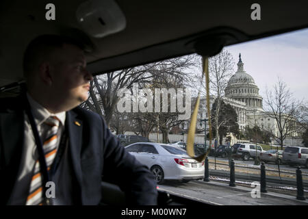 Washington, District of Columbia, USA. 17th Jan, 2018. The U.S. Capitol is seen from U.S. President Donald Trump's motorcade as he travels to Capitol Hill for a congressional Gold Medal ceremony, in Washington, DC, U.S., on Wednesday, Jan. 17, 2018. Photographer: Al Drago/Bloomberg.Credit: Al Drago/Pool via CNP Credit: Al Drago/CNP/ZUMA Wire/Alamy Live News