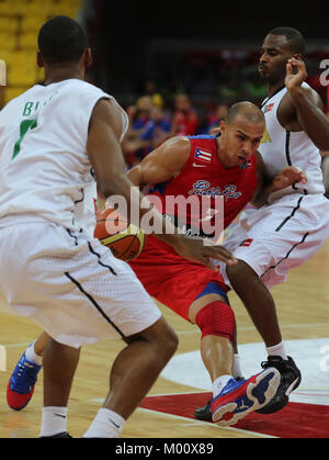 Caracas, Distrito Capital, Venezuela. 2nd Sep, 2013. September 02, 2013.The player Carlos Arroyo © , of Puerto Rico, tries to advance before the mark of the players Garfil Blair (i) and Adrian Uter (d), of jamaica, during the match of the first phase of the FIBA Americas Basketball pre World Cup 2013, in Caracas, Venezuela. Photo: Juan Carlos Hernandez Credit: Juan Carlos Hernandez/ZUMA Wire/Alamy Live News Stock Photo