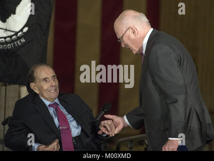January 17, 2018 - Washington, District of Columbia, United States of America - United States Senator Patrick Leahy (Democrat of Vermont), right, shakes hands with former US Senator Bob Dole (Republican of Kansas), left, after making remarks at a Congressional Gold Medal ceremony honoring Dole that was also attended by US President Donald J. Trump in the Rotunda of the US Capitol on Wednesday, January 17, 2017. Congress commissioned gold medals as its highest expression of national appreciation for distinguished achievements and contributions. Dole served in Congress from 1961 through 1996, Stock Photo