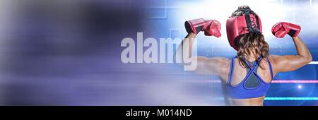 Boxer woman with bright lights in stadium Stock Photo