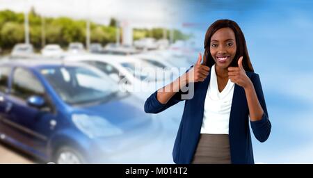 car sales woman thumbs up Stock Photo