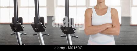 Fit athletic woman in gym Stock Photo
