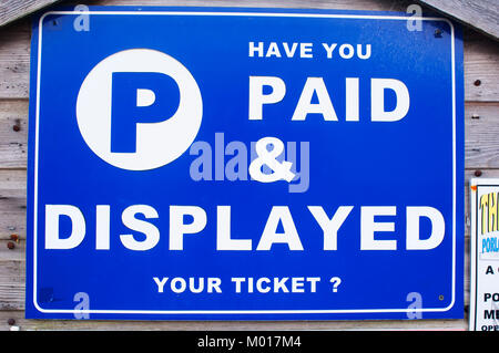 Have you paid and displayed car park sign reminding motorists to buy a parking ticket - John Gollop Stock Photo