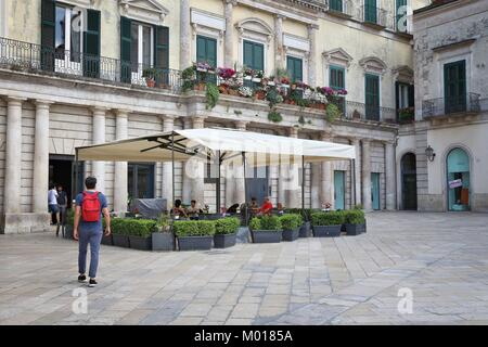 ALTAMURA, ITALY - JUNE 4, 2017: People visit Old Town of Altamura in Italy. Altamura is a major city in Apulia, with population of 70,556. Stock Photo