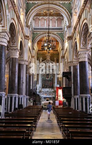 ALTAMURA, ITALY - JUNE 4, 2017: People visit the Cathedral of Altamura in Italy. Altamura Cathedral was built by Emperor Frederick II in 1232. Stock Photo