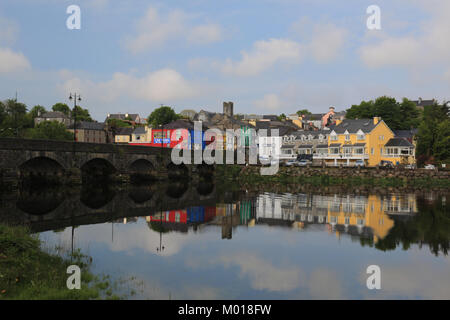 rural irish town reflected in the river laune, killoirglin, wild atlantic way, county kerry, ireland Stock Photo