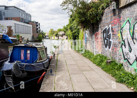 London, UK - April 2017. Narrowboats on the canalside towpath near Camden Town, , London, England, UK Stock Photo