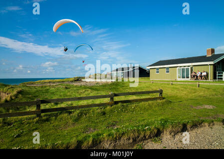 para gliders against blue sky coast of Denmark Stock Photo