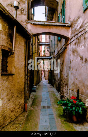 Narrow streets in Albenga, Italy. April 2017. Stock Photo