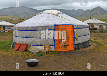 Yurt with colorful door in a camp of Mongolian nomads, Gorkhi-Terelj National Park, Mongolia Stock Photo
