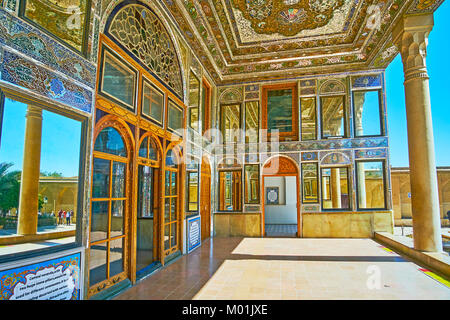 SHIRAZ, IRAN - OCTOBER 12, 2017: The mirror veranda of Qavam (Ghavam) House of Naranjestan complex is decorated with slender columns and different orn Stock Photo