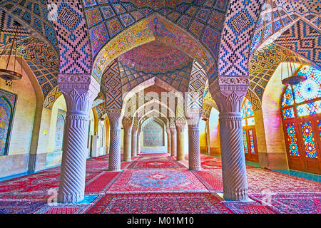 SHIRAZ, IRAN - OCTOBER 12, 2017: The Pink mosque is famous for its winter prayer hall, its perfect decorations attract tourists to visit and enjoy the Stock Photo