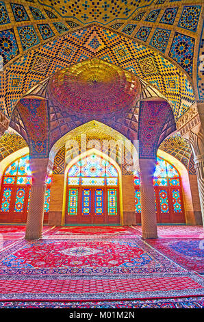 SHIRAZ, IRAN - OCTOBER 12, 2017: The  Pink mosque (Nasir Ol-Molk) is the architectural masterpiece of the city, its beautiful interior with different  Stock Photo