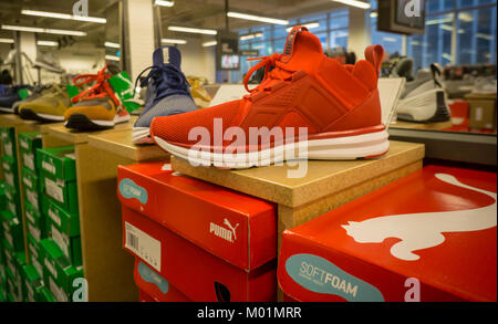 Puma brand sneakers in a shoe store in New York on Friday, January