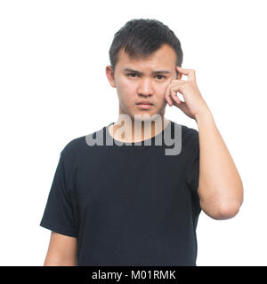 young asian man with thoughtful expression, scratching his head in thought, and posing for portrait isolated on white background with clipping path Stock Photo