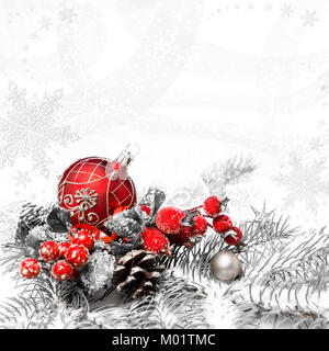 Red Christmas decorations on neutral winter background, greeting &quot;Frohe