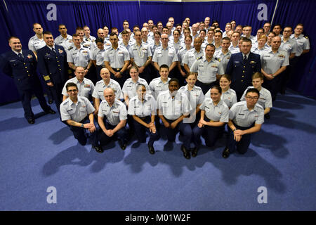 Coast Guard Cutter Mellon crewmembers pose for a group Stock Photo