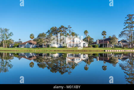 Upscale waterfront homes along Dye's Valley Course at Sawgrass Players Club, a private, gated golf community in Ponte Vedra Beach, Florida. (USA) Stock Photo