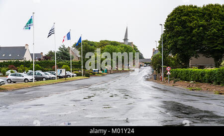 PLOUGRESCANT, FRANCE - JULY 2, 2010 - car parking on Hent Sant Gonery street and view of Chapelle Saint-Gonery in Plougrescant town of the Cotes-d'Arm Stock Photo