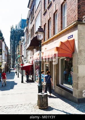 AACHEN, GERMANY - JUNE 27, 2010: people on Kramerstrasse street in historic center of Aachen city in summer. Aachen town was the place where 31 Holy R Stock Photo