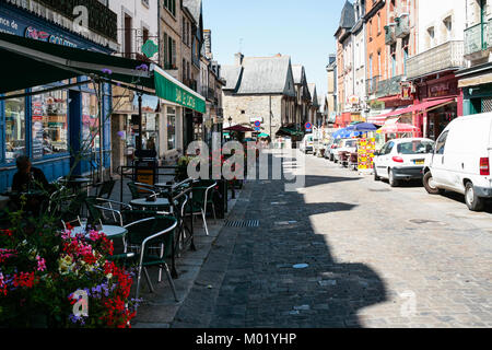 VITRE, FRANCE - JULY 7, 2010: shops and restaurants on street Rue de la Poterie in Vitre old town. Vitre is a commune in the Ille-et-Vilaine departmen Stock Photo