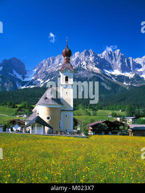 Going church and village and the Kaiser Wilhelm mountain, Tyrol, Austria range, Tirol, Austria Stock Photo